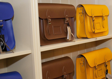 Cambridge Satchel Company products on a shelf